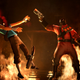 Team Fortress 2 character the Pyro blasts an enemy with a gun.